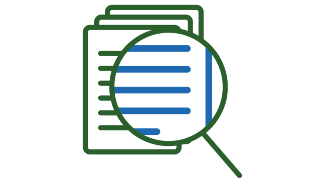 a magnifying glass inspecting documents